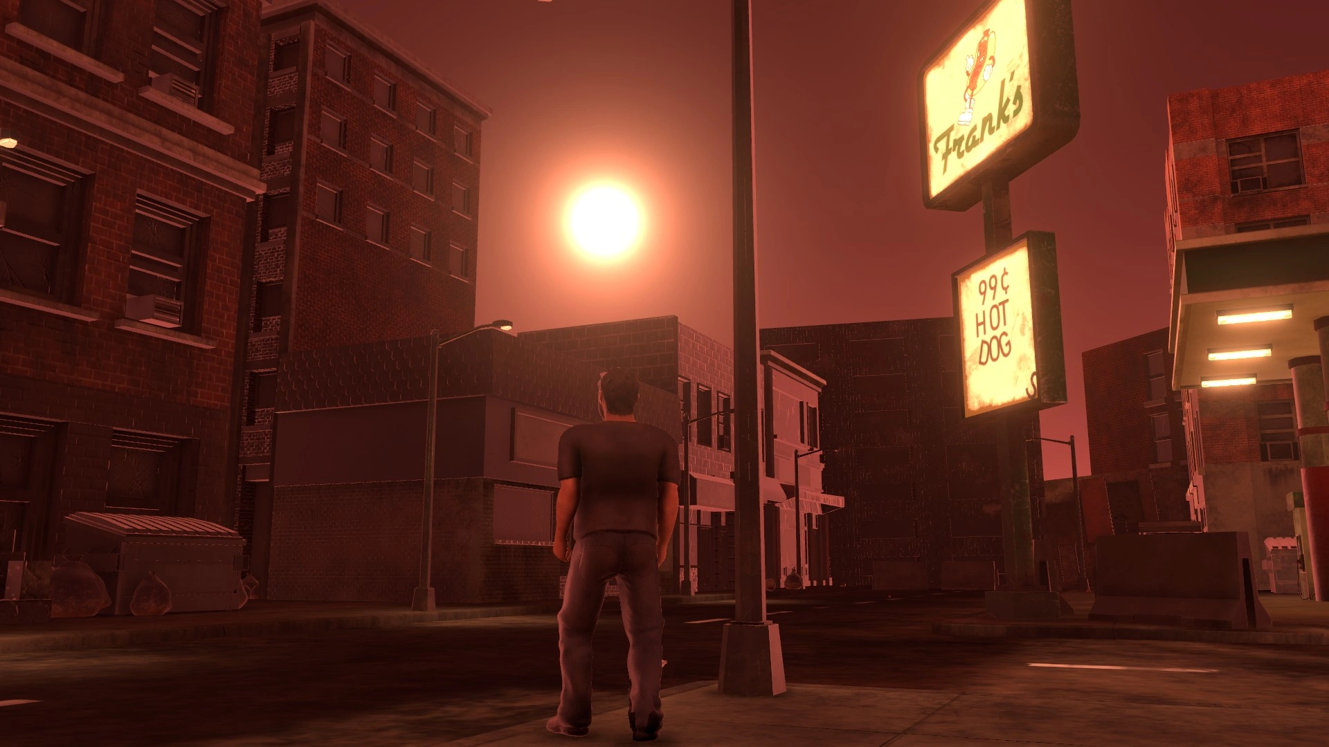 a 3d model of an adult male stands in the middle of a city block covered in dust and grime. he stares at the sun over the tops of the empty buildings. on the right third of the image stands the illuminating tall gas station with bright fallen lettering. there is trash scattered about. one of the roads in the back is blocked off by a fallen building.