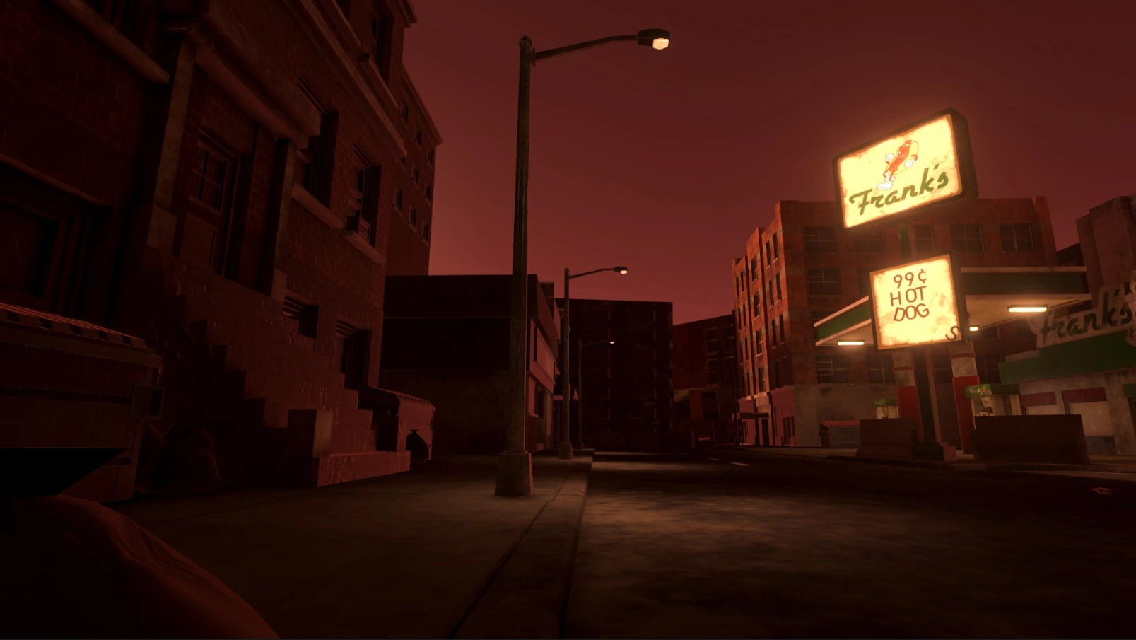 a low angle shot showing a better visual shot of the street lights of this dusty grimy red tinted city block town. the entrance to an old building takes up the first third of the image. the latter third is the illuminated gas station. in the foreground is a trashbag.